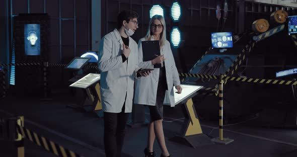 Young and Beautiful Scientists Go to the Laboratory of the Space Station and Talk About the Project