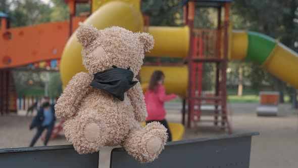 Masked on the playground. Childhood into a pandemic.