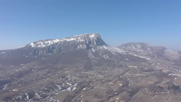 Winter scenery with Stol mountain 4K drone footage