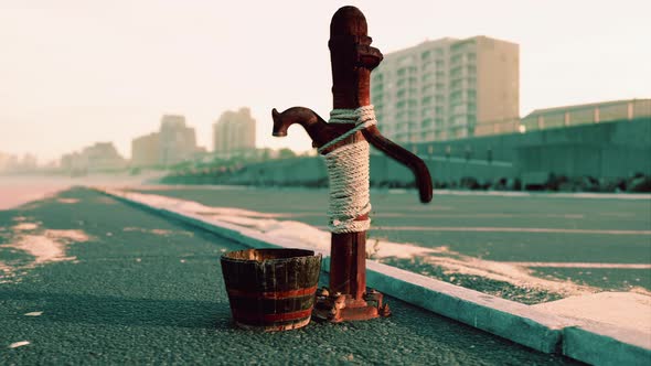 Old Rusty Water Pump at Sunny Day