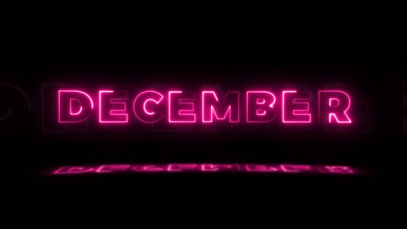 Word 'DECEMBER' neon glowing on a black background with reflections on a floor alt