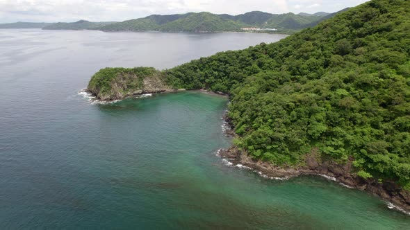 Beautiful sea in Costa Rica surrounded by nature and small islands.