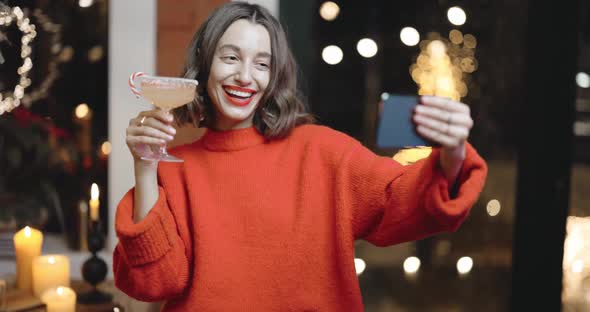 Woman Celebrating New Year Holidays Online