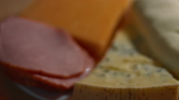 Various Types of Savory and Fresh Cheeses and Pork Ham Ready To Be Cut As Appetizer  Video