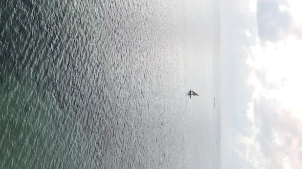 Tanzania Vertical Video  Boat Boats in the Ocean Near the Coast of Zanzibar Aerial View