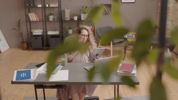 Pregnant Woman Using Tablet Computer