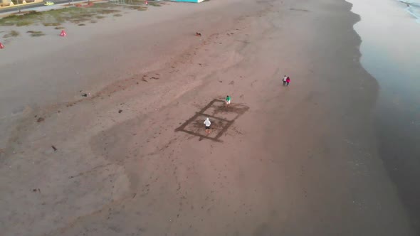 Sunset, Beach volleyball, pacific ocean coast (La Serena, Chile) aerial view