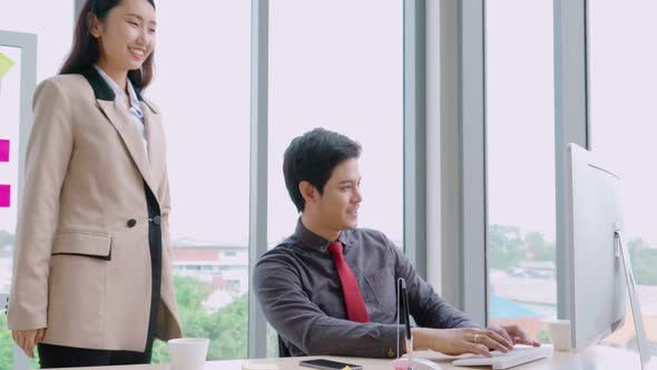 Business People Handshake with Friend at Office