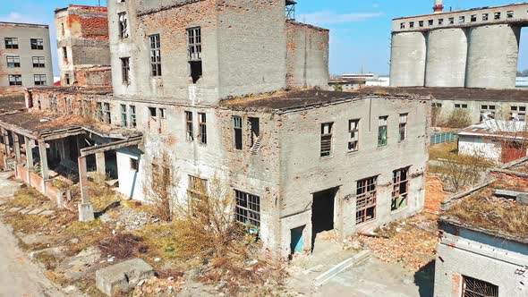 Abandoned ruined industrial factory building, ruins and demolition concept. Aerial view