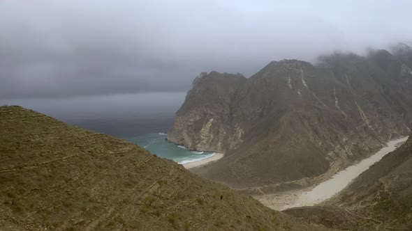 Salalah, Aerial view of Beach Between Mountains, Salalah, Oman