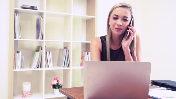 Blonde Business Woman Working at Modern Office