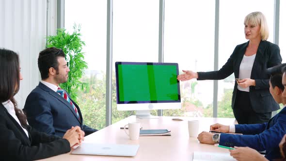 Business People in the Conference Room with Green Screen