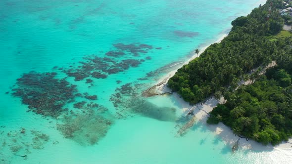 Aerial top down nature of idyllic seashore beach trip by shallow water and clean sandy background of