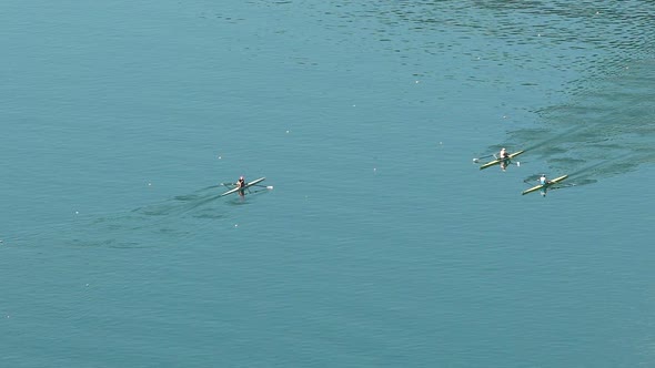 Boat Racing Competition, Athletes Rowing Boats and Trying to Win the Race