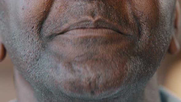 Extreme Close Up Unshaven Male Wrinkled Human Face Unrecognizable African American Smiling White