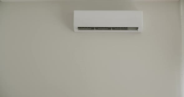 White Air Conditioner on the Wall 