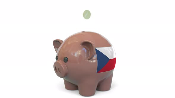 Putting Money Into Piggy Bank with Flag of the Czech Republic alt