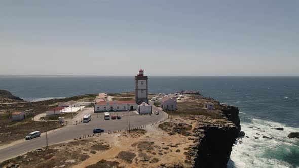 Peniche lighthouse and Cabo Carvoeiro in Portugal. Aerial circling