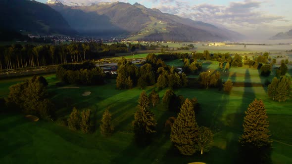 Drone Over Sunlit Landscape Of Zell Am See At Dawn