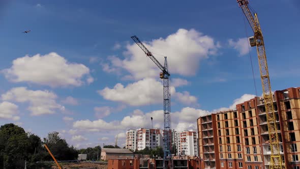 Construction Site with Crane and Building