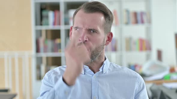 Portrait of Aggressive Young Man Angry on Video Chat 