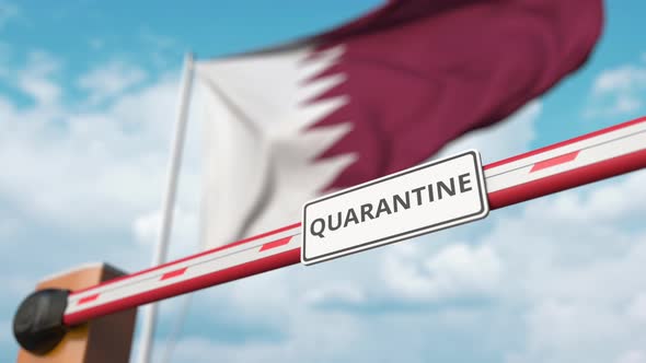 Barrier with QUARANTINE Sign Being Open Near Flag of Qatar