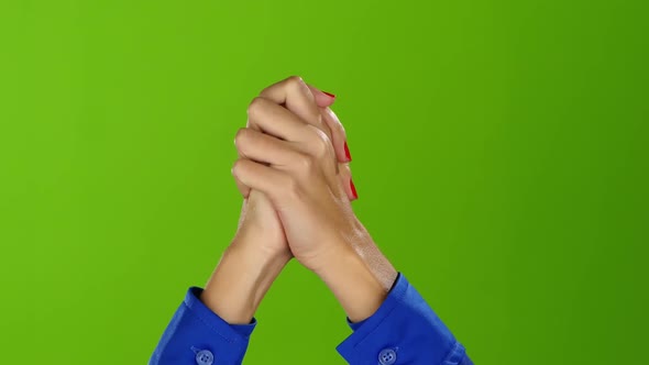 Green Screen Studio. Girl Crosses Her Handbreadth of Two Hands