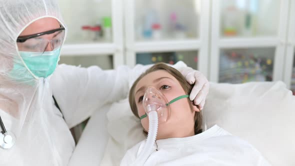 Doctor Intubating a Kid Having a Respiratory Desease