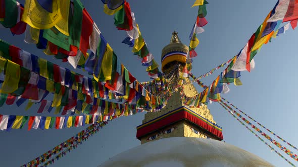 Prayer Flags at Boudhanath Stupa in Sunrise Lights