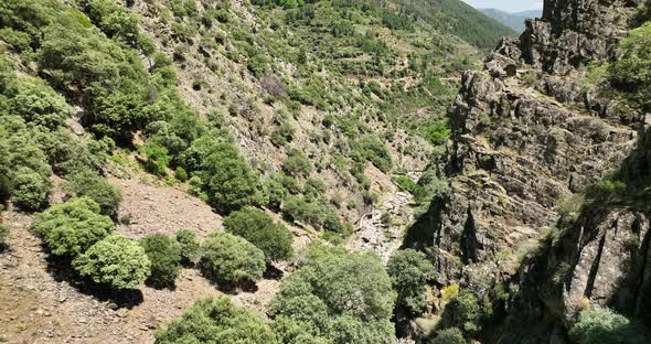 HE SPECTACULAR MEANCERA WATERFALL IN THE NORTH OF EXTREMADURA LANDSCAPED IN A NATURAL PLACEA WATERF