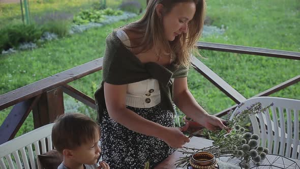 Mother and Son Making Decorative Flower Pot