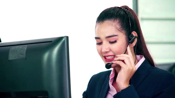 Business People Wearing Headset Working in Office