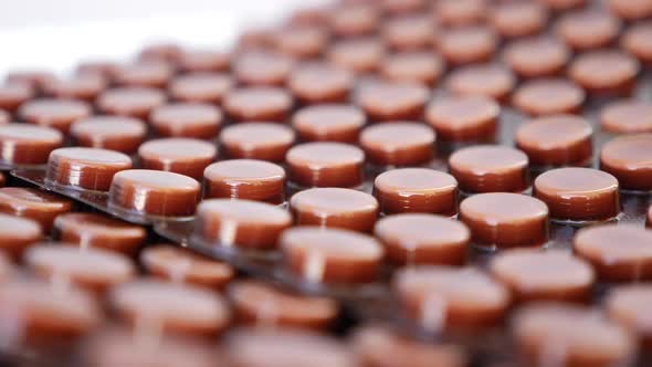 Macro shot of tablets, brown colored medicine shot