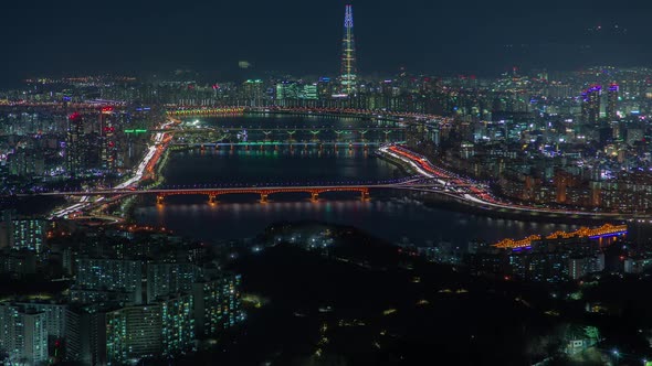 Illuminated Bridge and Big Lotte Seoul Tower Korea