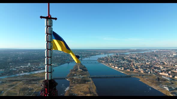 Ukrainian Flag Waving on Top of the Riga TV Tower in Latvia