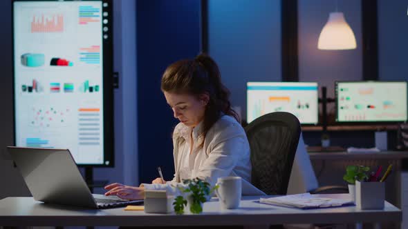 Business Woman Working Overtime Checking Team Project Taking Notes