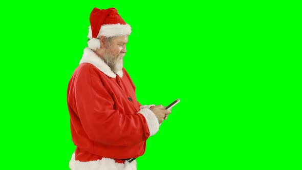 Santa claus using mobile phone