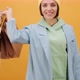 Black Friday Video Footage - A Woman Hand Her Shopping Bags - VideoHive Item for Sale