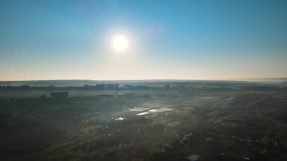Aerial View of the Suburbs of the City at Sunrise in the Spring Morning