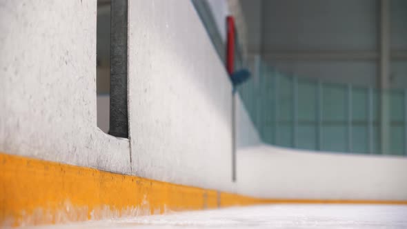 A Girl Figure Skater Walks on the Public Ice Rink