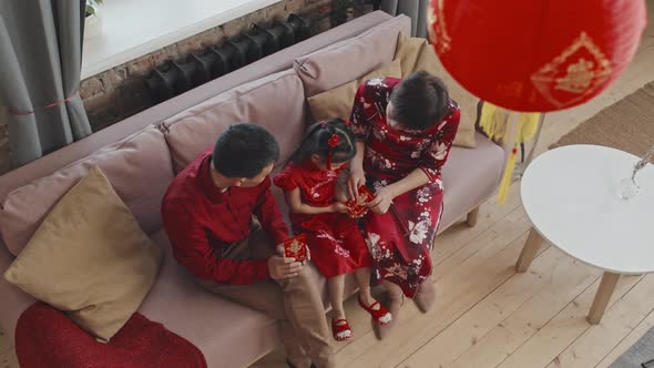 Top View of Family Celebrating Chinese New Year