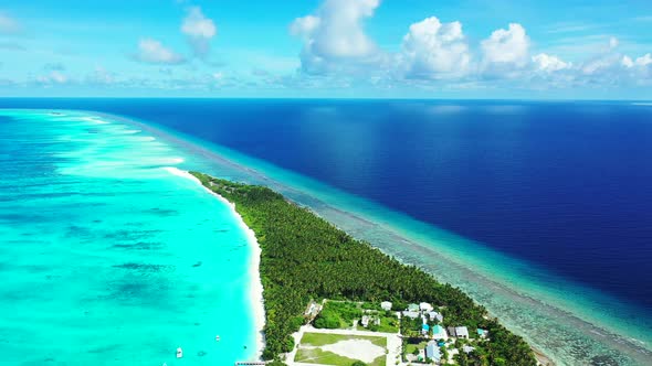 Luxury flying abstract view of a white paradise beach and aqua turquoise water background in best qu