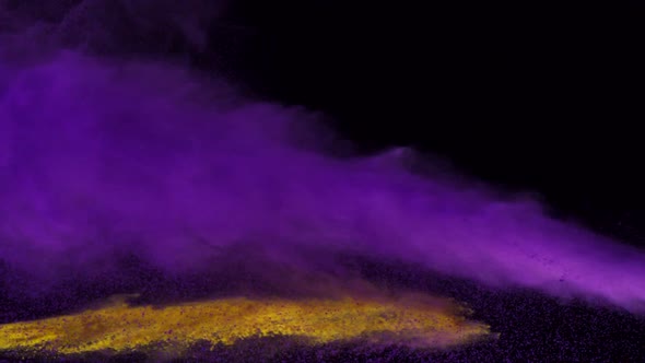 Purple and yellow powder colliding in the air, Slow Motion alt