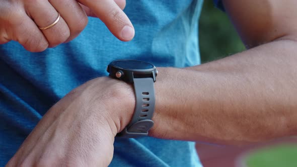 Man Use Fitness Smart Watch Checking Results After Sport Training