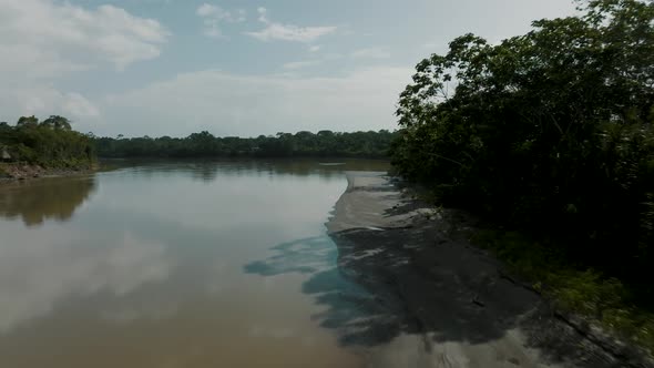 Fly Over Shallow River With Sandbank In The Jungle Of Ecuador Amazon. Aerial Drone Shot