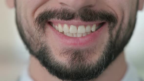 Close Up of Smiling Mouth of Young Man