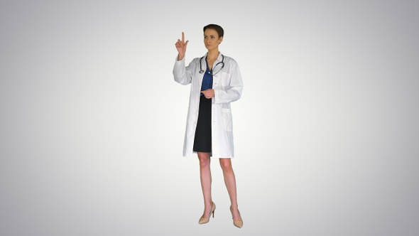 A Futuristic Young Pharmacist Uses Virtual Screen on Gradient