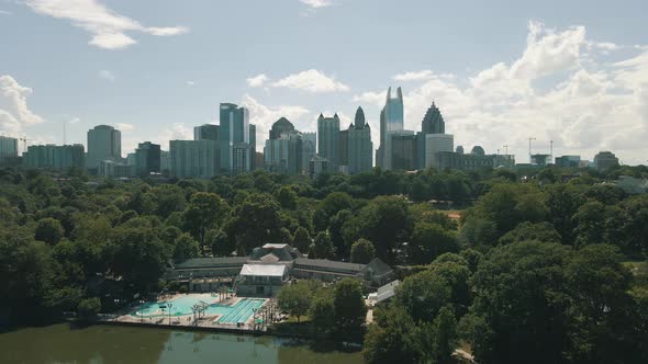 Beautiful drone footage of Midtown Atlanta and Piedmont Park on a clear sunny day