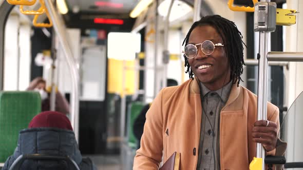 African Businessman Going To Work By Bus