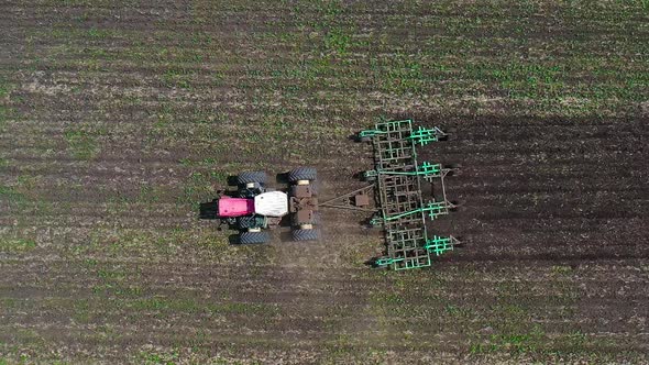 Aerial View  Tractor Plow Cultivating Field